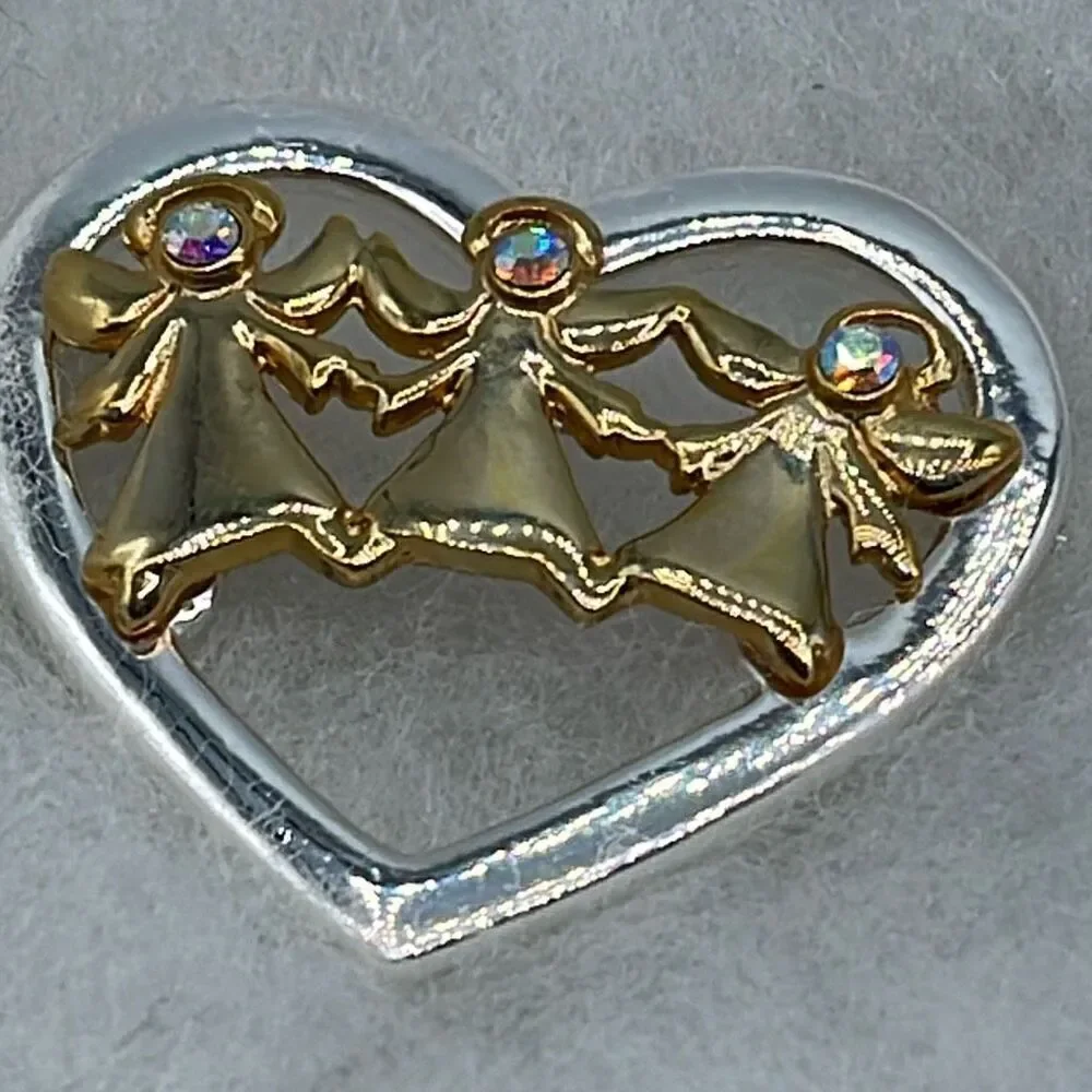 Vintage heart Angel trio Aura Borealis brooch.